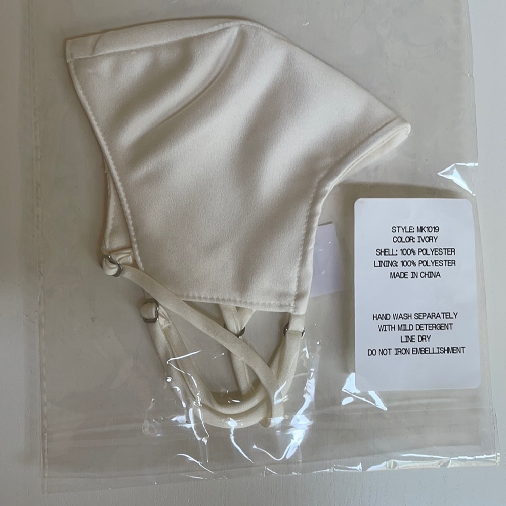 Ivory face mask from David’s Bridal.